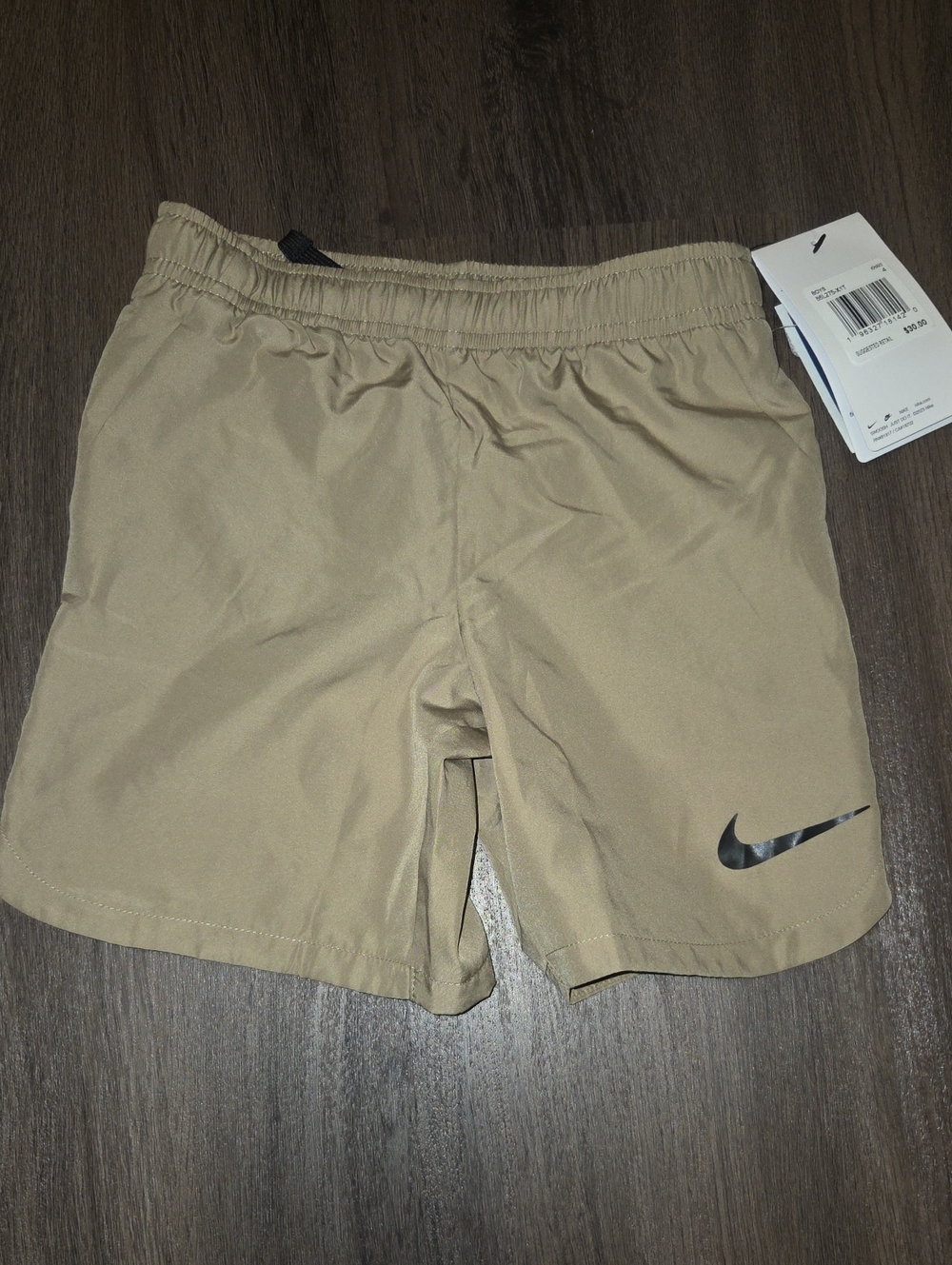 Nike Tan Active Shorts with Black Swoosh